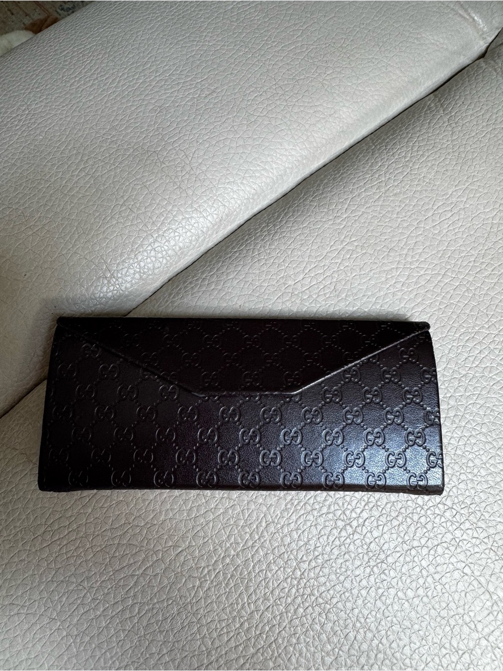 Gucci Brown foldable sunglasses case.